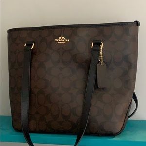Brand new lightly used coach purse